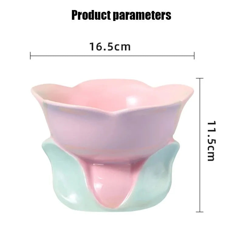 Blue ceramic elevated pet bowl with floral pattern and non-slip base for cats and small dogs