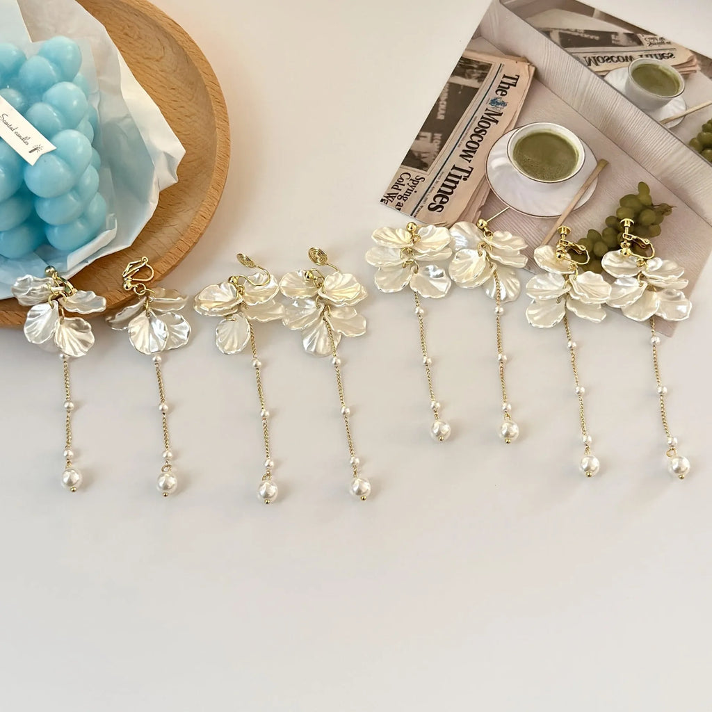 Women's acrylic shell pearl tassel earrings with approximately 8.8cm length and multiple clip options