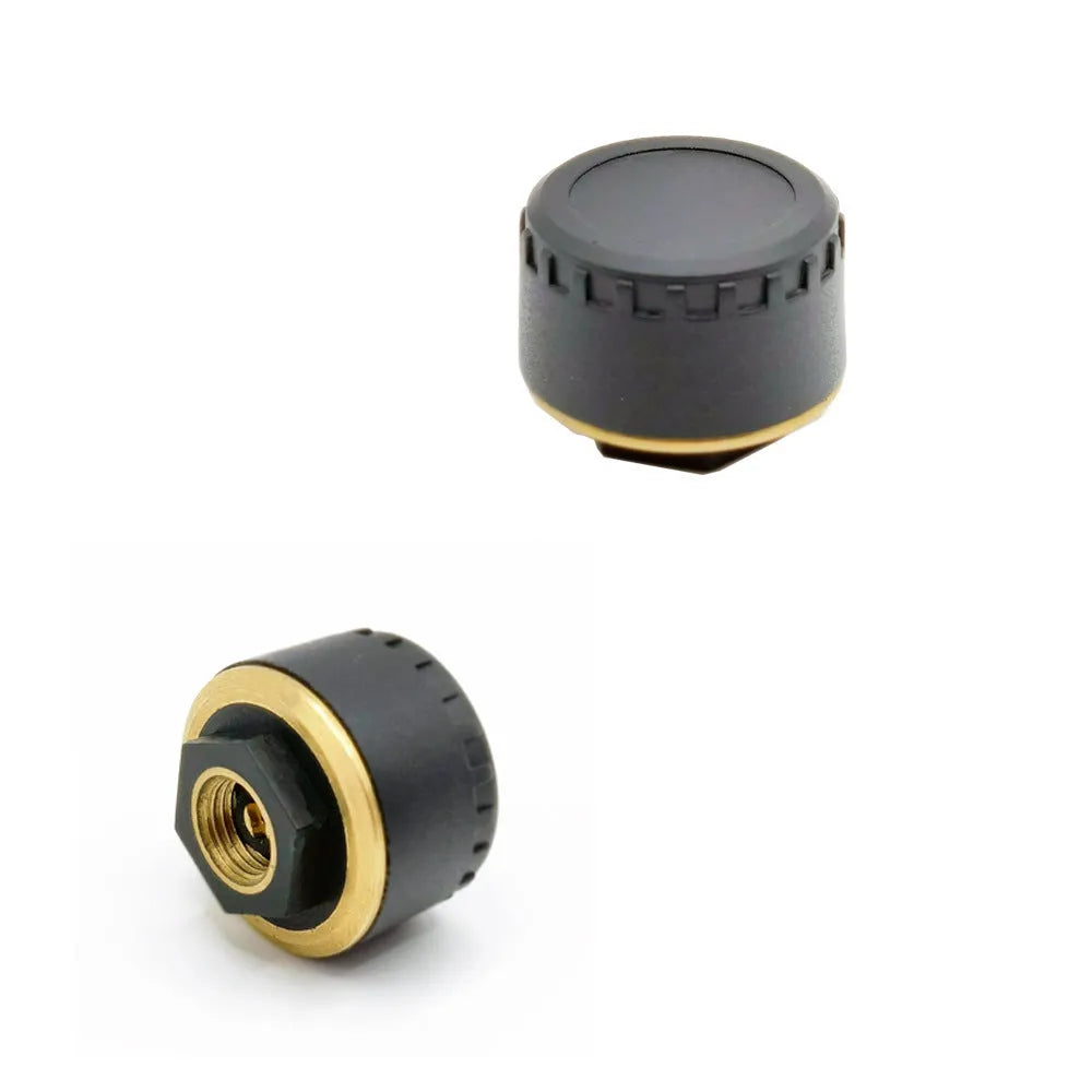 Bluetooth tyre pressure monitoring system showing four black sensors for smartphone display