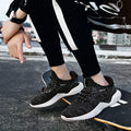 Low-top student running shoes with a front strap and breathable mesh upper.