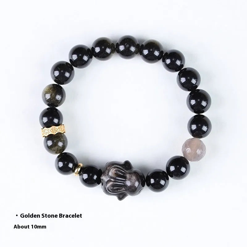 Handmade lying rabbit charm bracelet in Jin Yaoshi or Silver Yaoshi with 8mm or 10mm beads and grey agate accents.