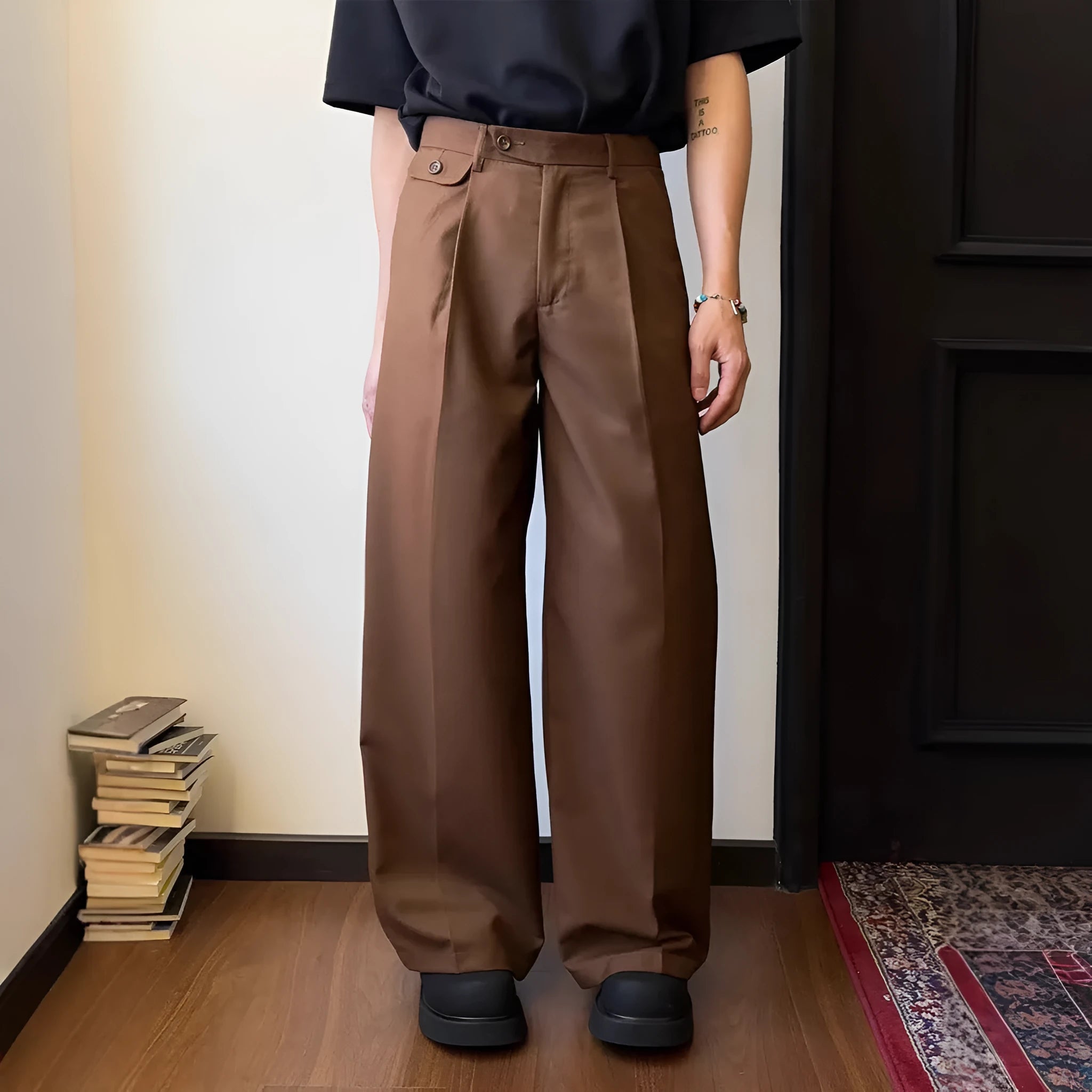 Men's brown straight-leg loose wide-cut casual trousers on a hanger