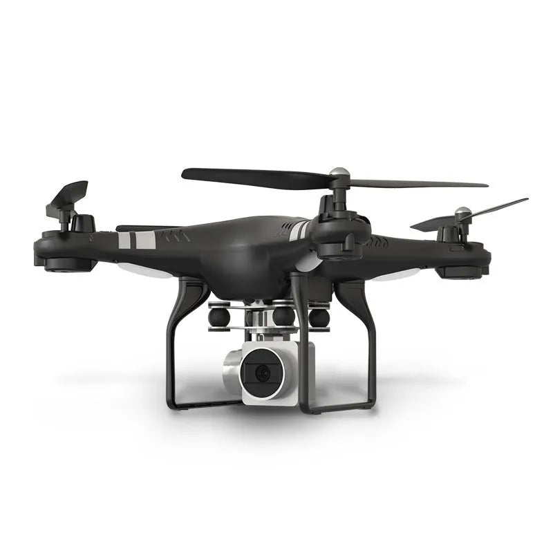Black HD aerial photography drone with alloy frame and remote control handle on a table