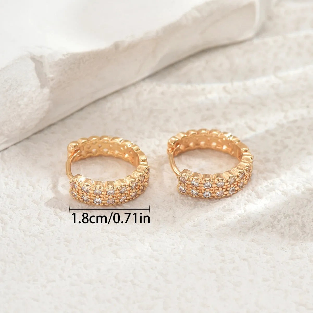 Copper geometry pattern ear studs with round, dot and ring elements in colour DE20288
