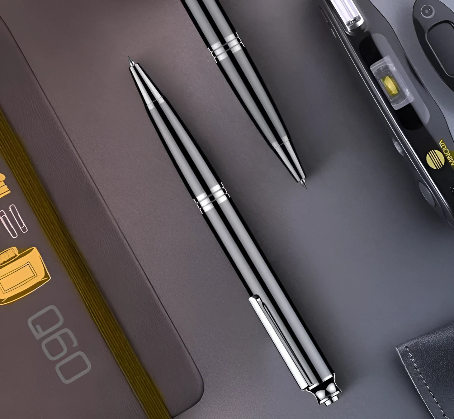 Black pen-style USB voice recorder MP3 player showing length and slim diameter