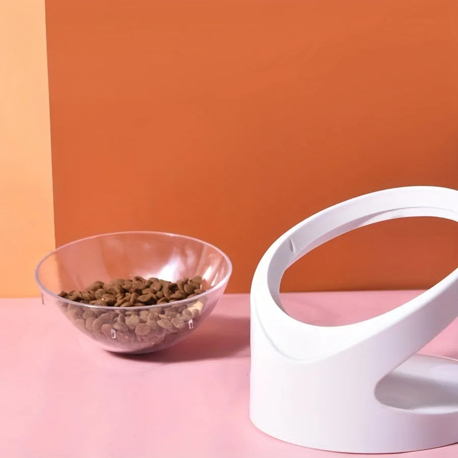 White elevated plastic cat food bowl with clear dish on a tilted stand