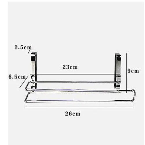 Silver stainless steel paper towel rack hanging over cabinet door for kitchen storage
