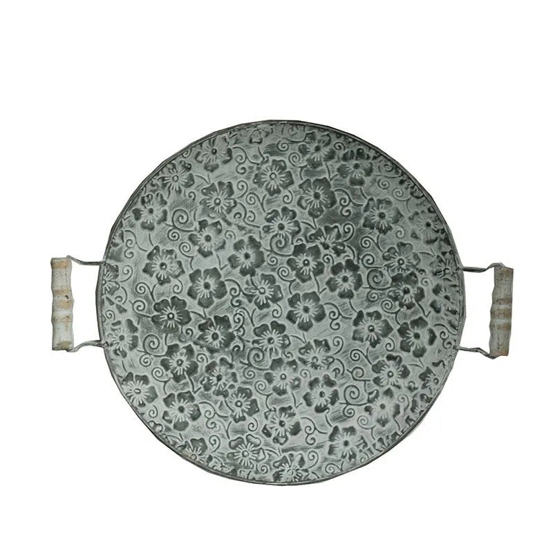 Round wrought iron storage tray set showing large and small sizes in European style