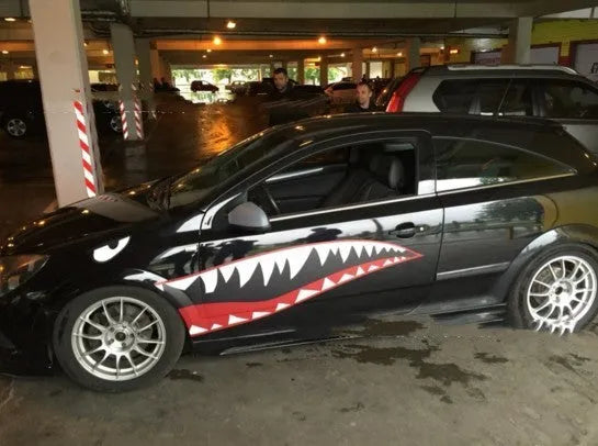 Large shark design PVC body sticker for car door, showing strong adhesive backing.