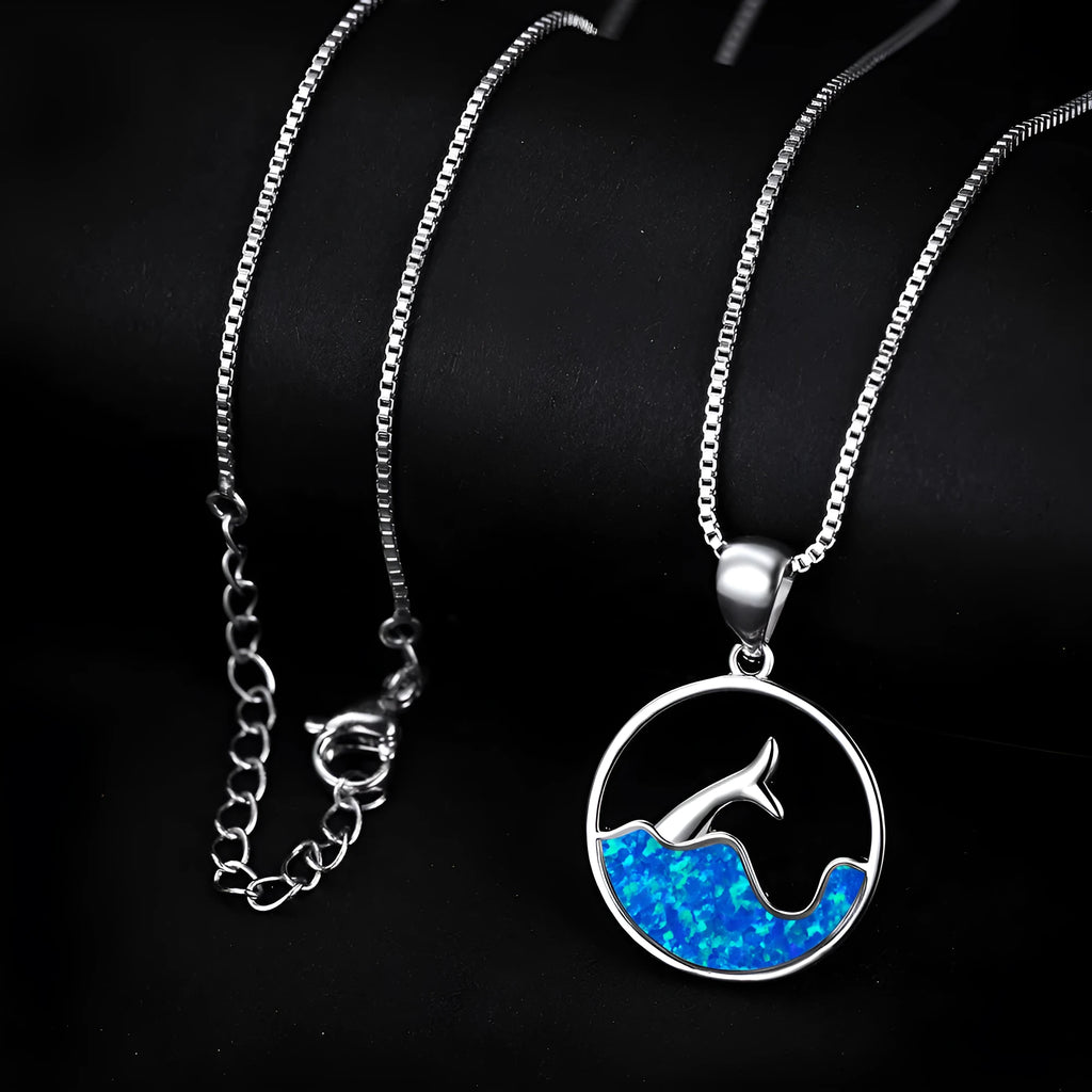 Round blue opal fishtail geometric pendant necklace on a chain, platinum electroplated copper finish.