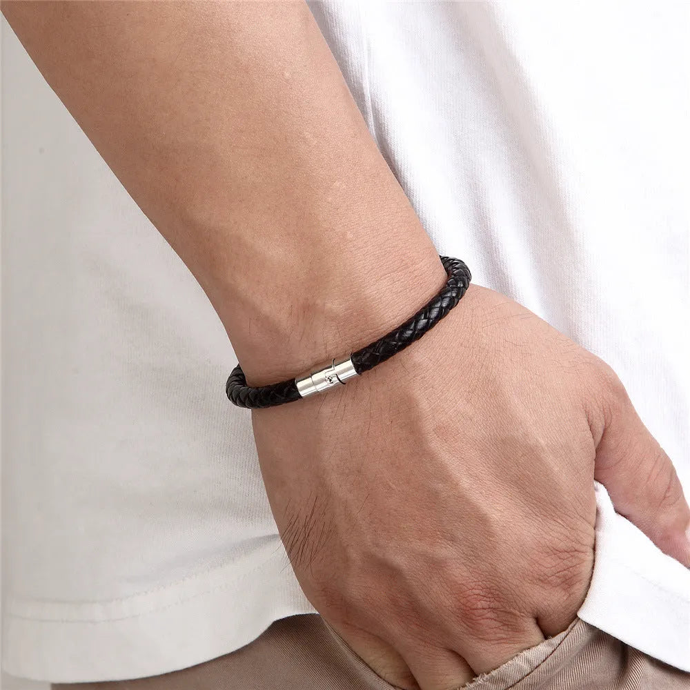 Titanium steel wire bracelet with magnetic clasp shown in a geometric unisex design.