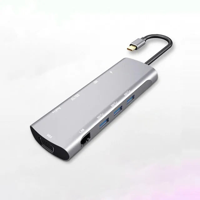 Grey USB-C docking station with aluminium alloy shell and 140mm cable showing HDMI and VGA ports
