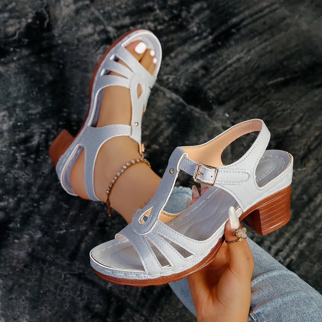 Women's peep toe wedge platform sandals in beige with a buckle strap on a PU leather upper.