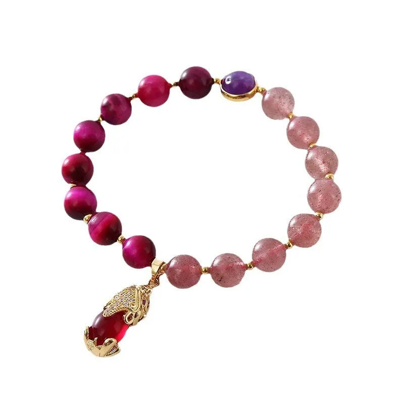 Strawberry crystal bead bracelet on elastic rope measuring 18cm with simple design