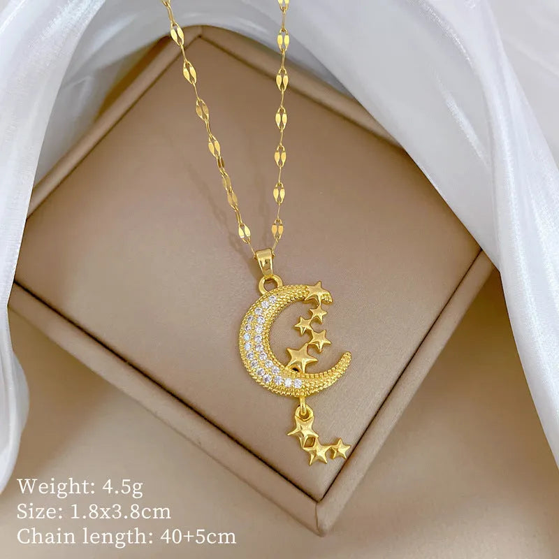 Moon pendant necklace with geometric tassel design and diamond arrangement on stainless steel chain
