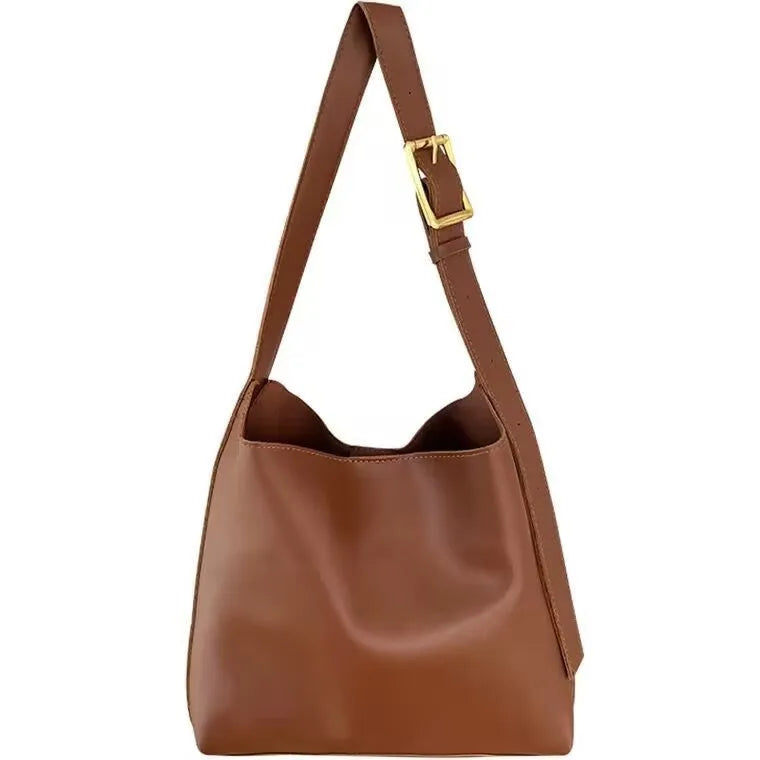 Two women's fashion shoulder bags: black with ribbon and brown with packet designs showing swing thread details