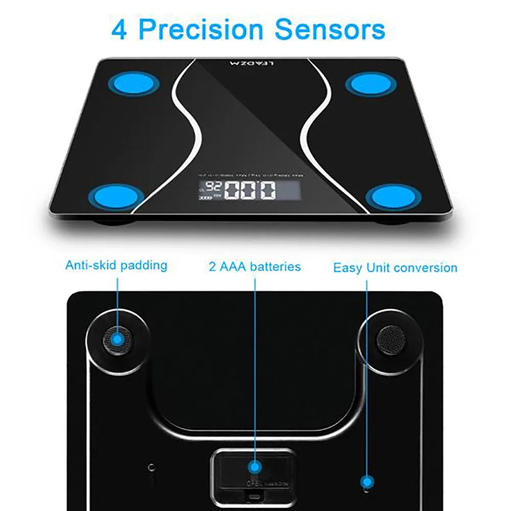 Black electronic digital bathroom scale on a bathroom floor