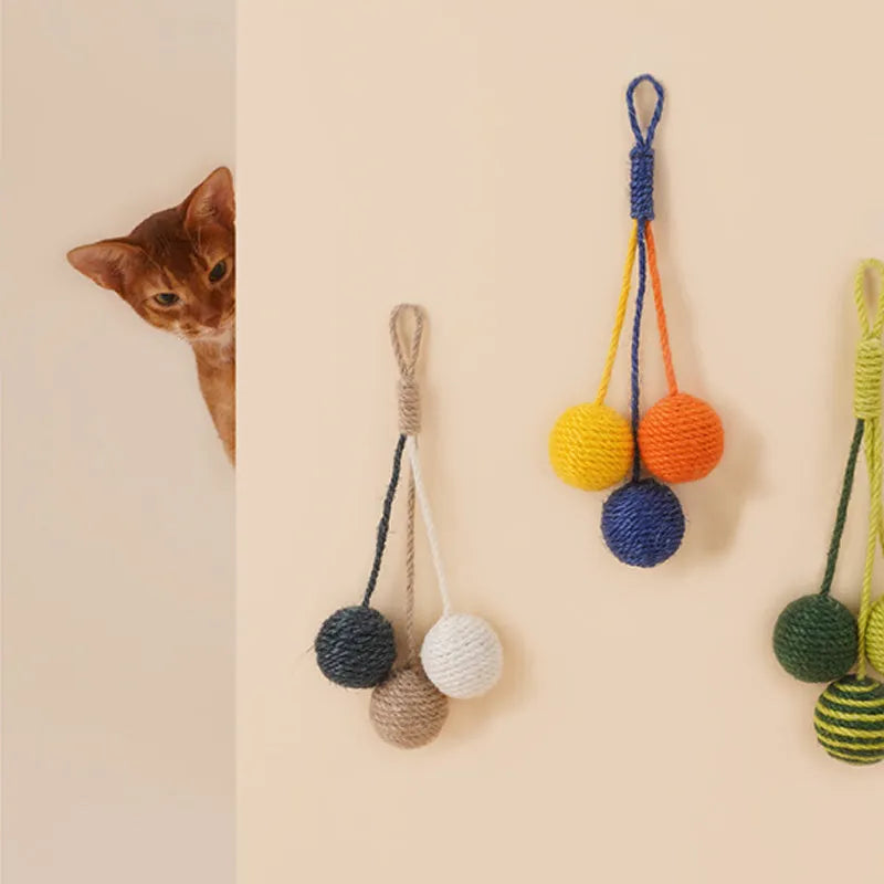 Cat teaser stick toy with catnip ball attachment, 255mm long with feather end.