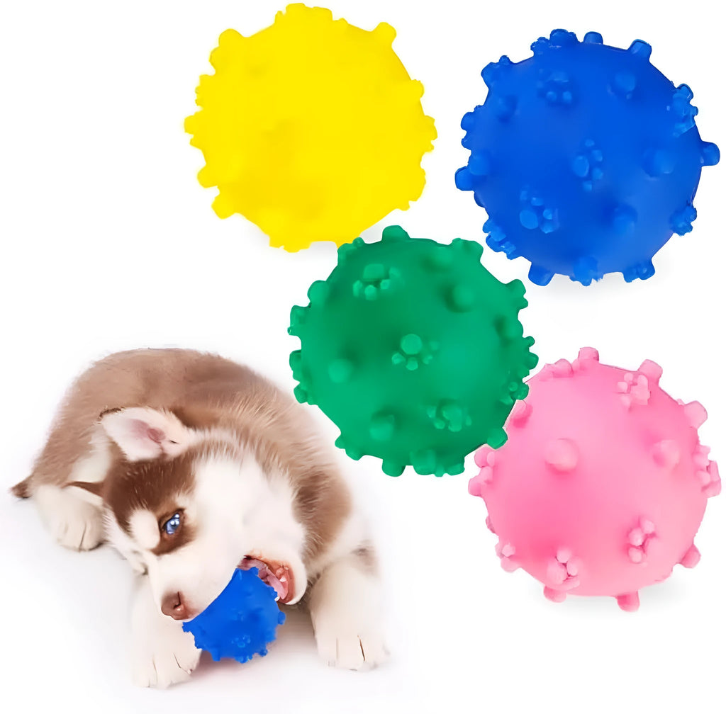 Bright blue, green, pink, and yellow spiky dog toy balls with paw print dimples, shown next to a small dog.
