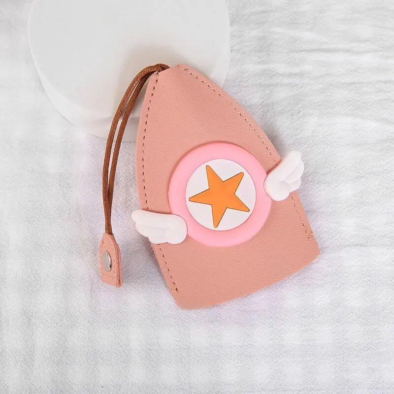 Cartoon patterned pull-out car key case made from PU leather, showing the open design.