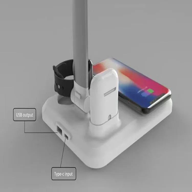 Black or white X-1 4-in-1 LED desk lamp showing wireless charging surface and USB port