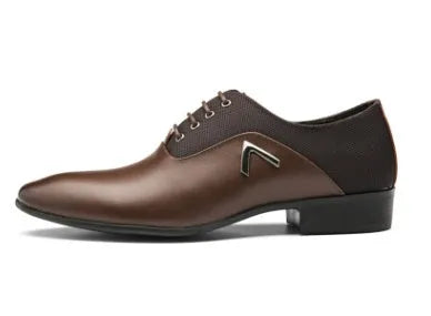 Men's black Oxford shoe with artificial PU upper and rubber sole on a white background