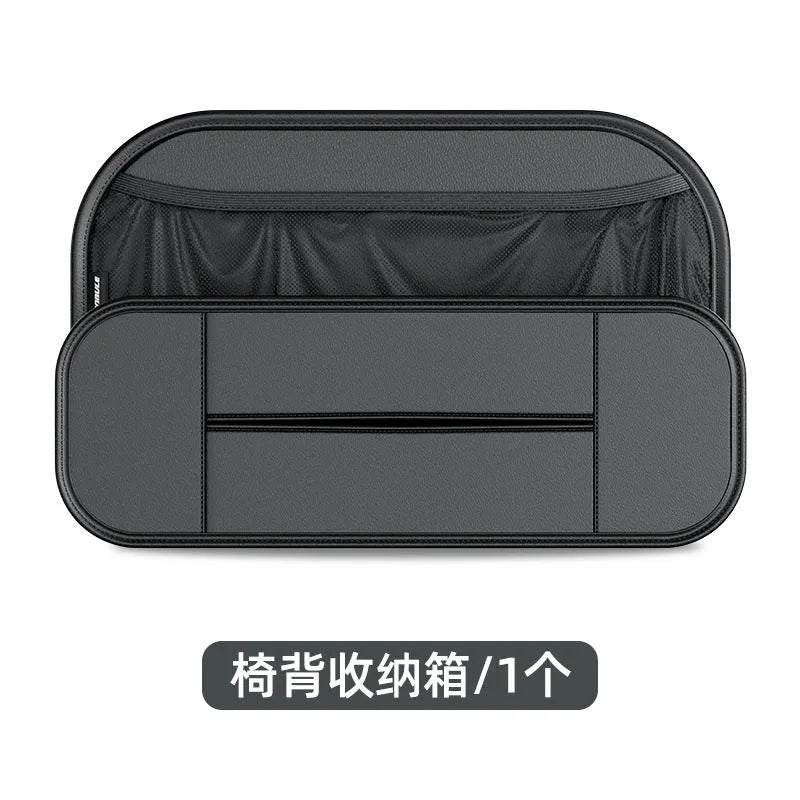 Black leather car seat back storage bag with mesh pockets for phones and bottles.