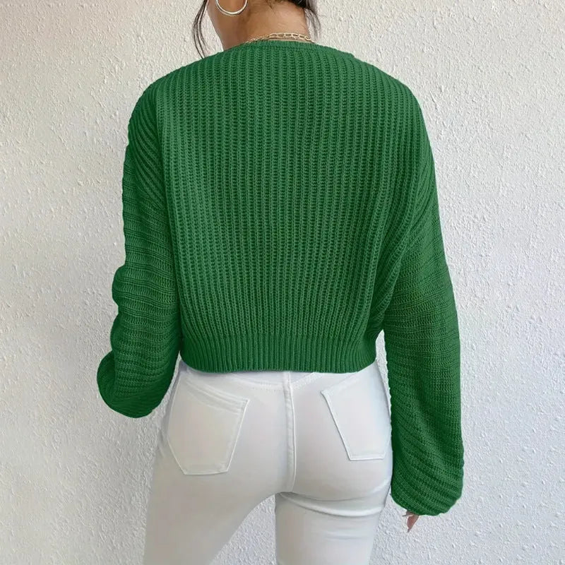 Women's long sleeve pullover in solid colour with loose casual fit and threads decorative element