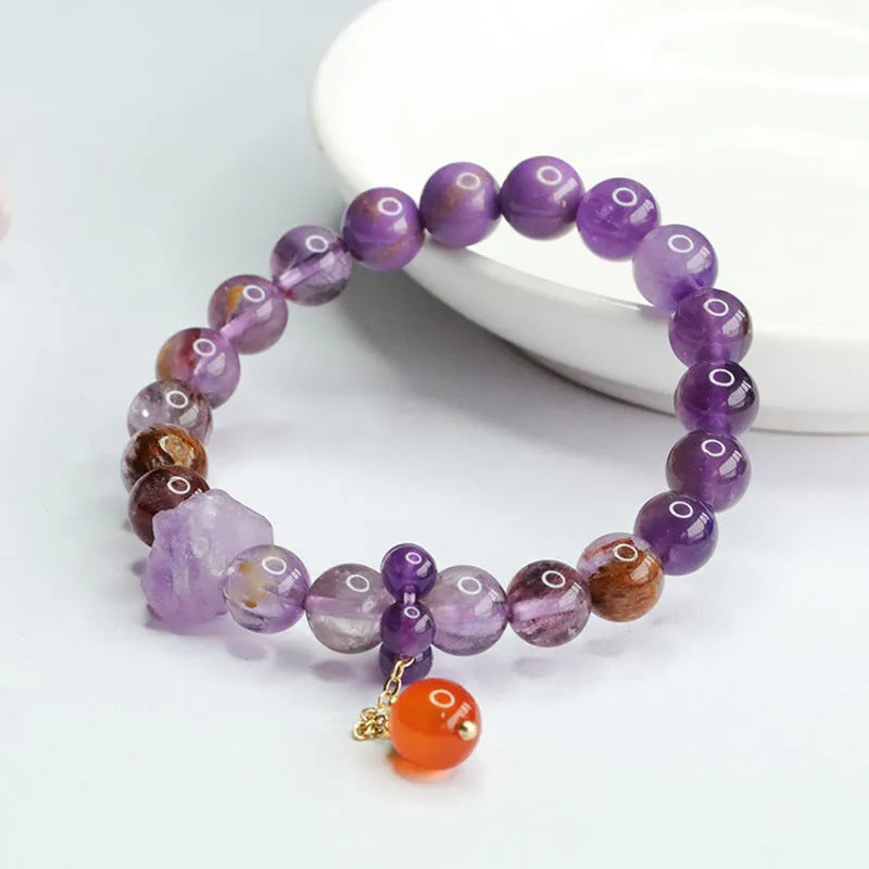 Natural nine purple crystal bracelet with amethyst beads and red agate accents in Mori style