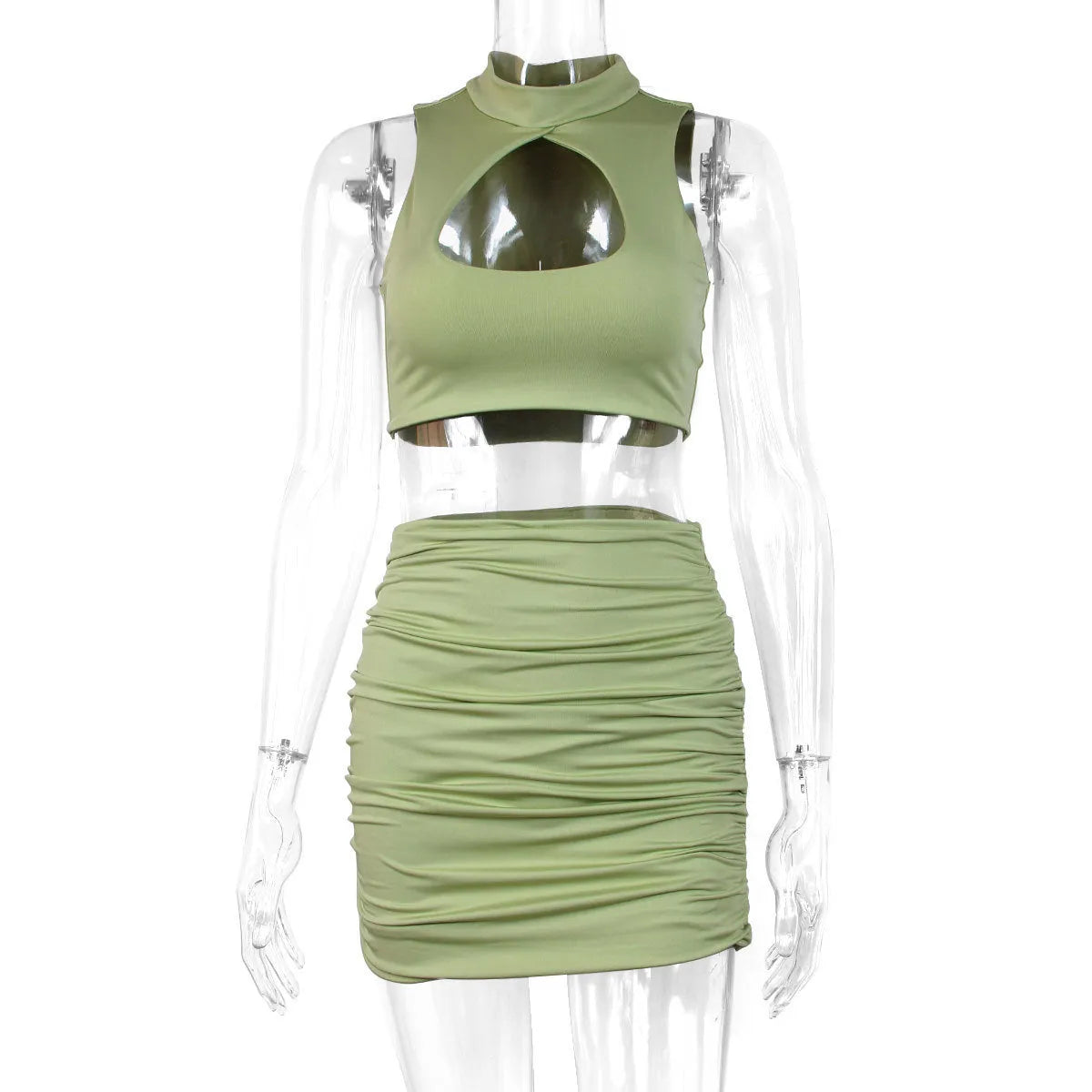 Women's light purple two-piece set with a hollow-out vest and a split hip skirt.