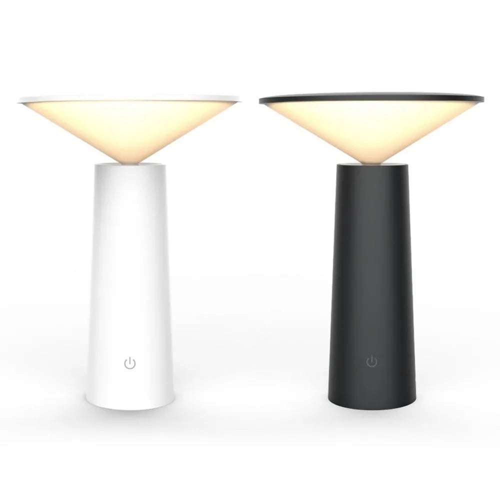 Black USB LED desk lamp with touch sensor base and an angled lamp head on a wooden desk.