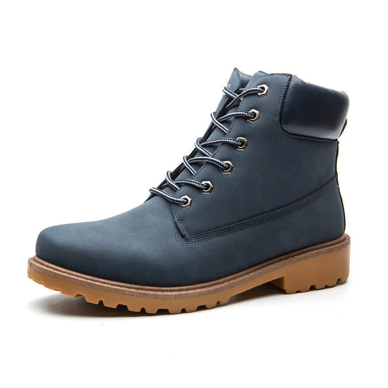 Men's pink Martin boots with velvet lining, flat sole, and round toe on a lace-up high-top.