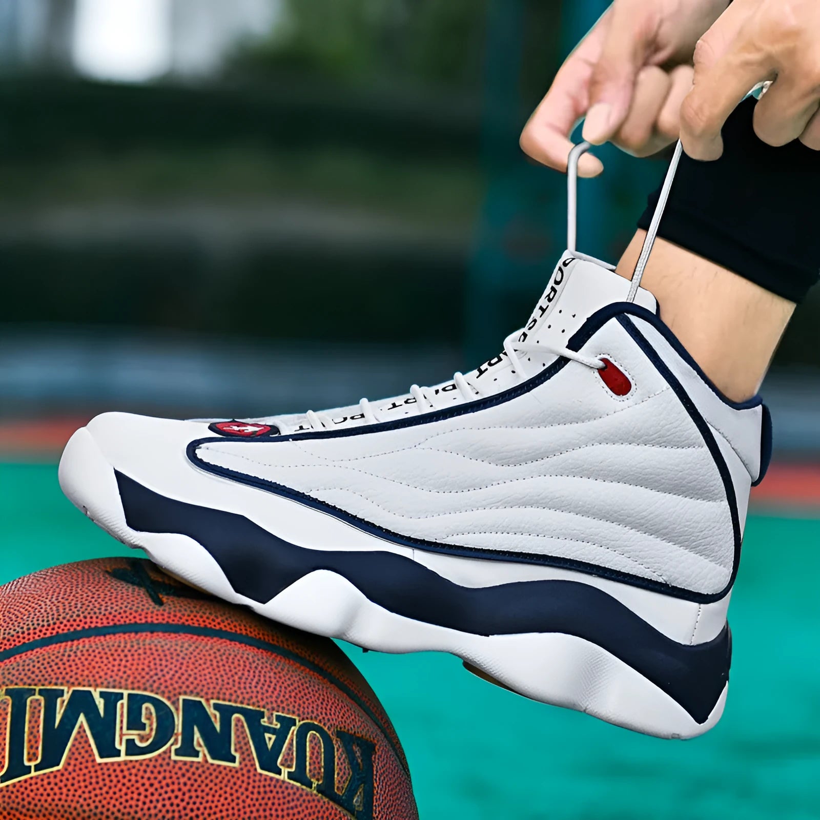 Men's high-top basketball shoes in AJ13 white red colour with mesh upper and rubber sole.