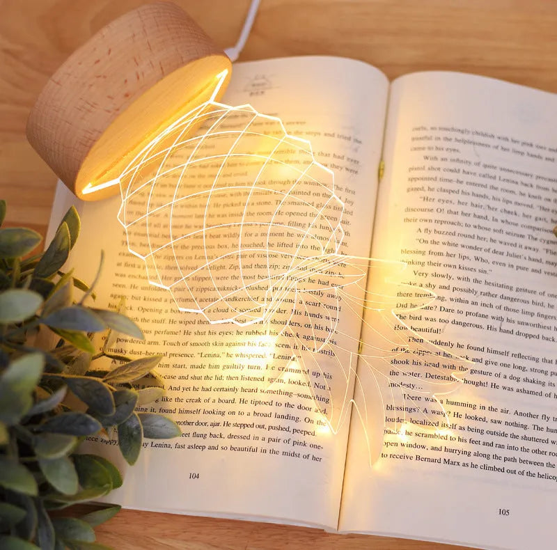 Wood and acrylic pineapple-shaped USB table lamp with dimmer switch on a bedside table.