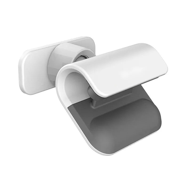 Black universal car phone holder with 360-degree rotating ball joint on a car dashboard.