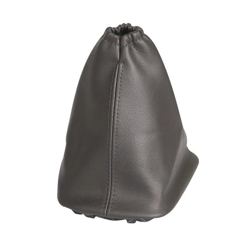 Black leather dust cover for a Toyota Corolla gear shift lever, showing dimensions.