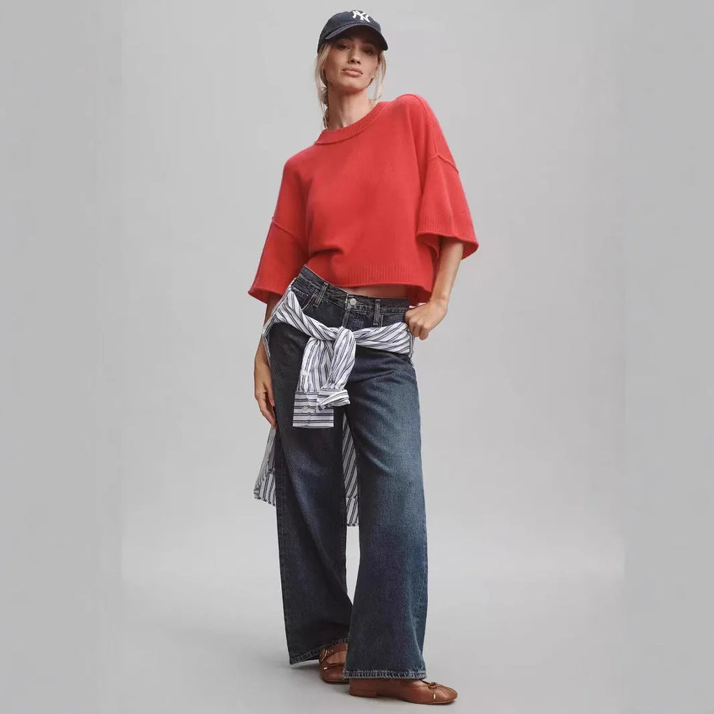 Red cropped short sleeve T-shirt with an exposed navel design on a mannequin.