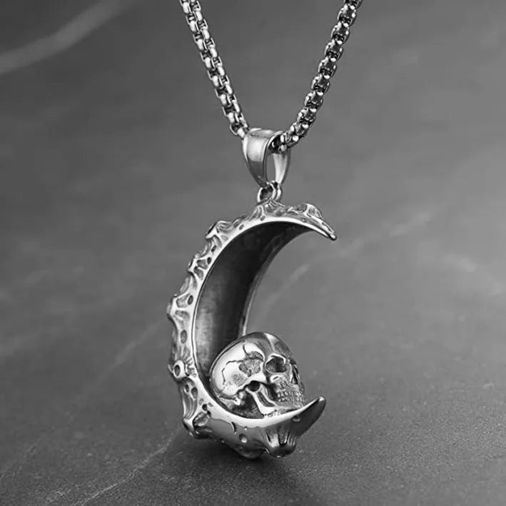 Men's stainless steel skull necklace with electroplated silver finish showing six pendant design variations