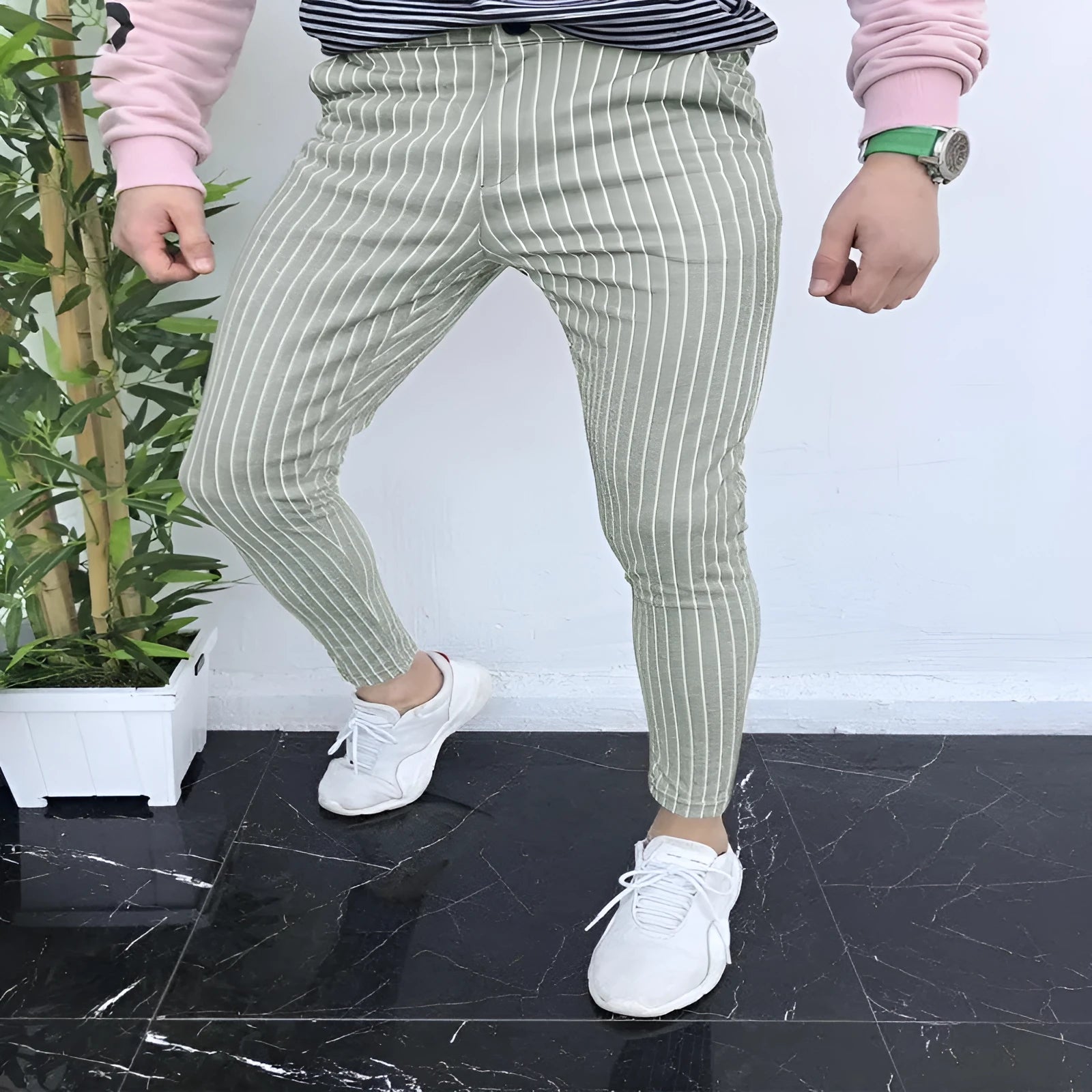 Men's slim-fit plaid casual trousers with elastic waist and straight leg styling
