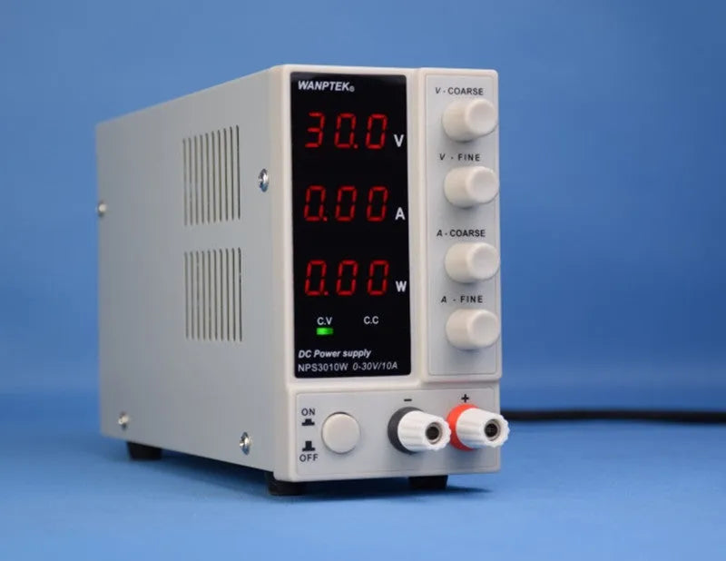 White adjustable DC bench power supply unit with control knobs and display, model NPS605W