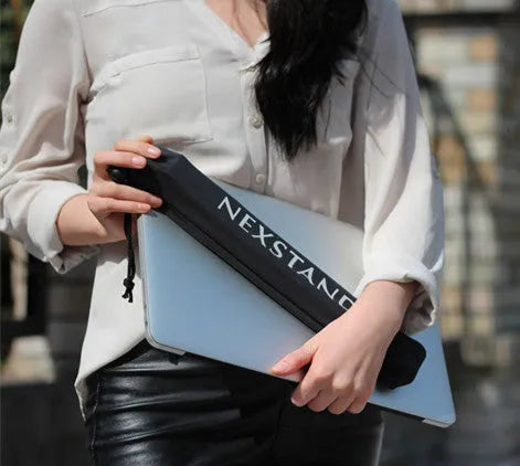 Black folding laptop stand with adjustable height mechanism and reinforced nylon construction