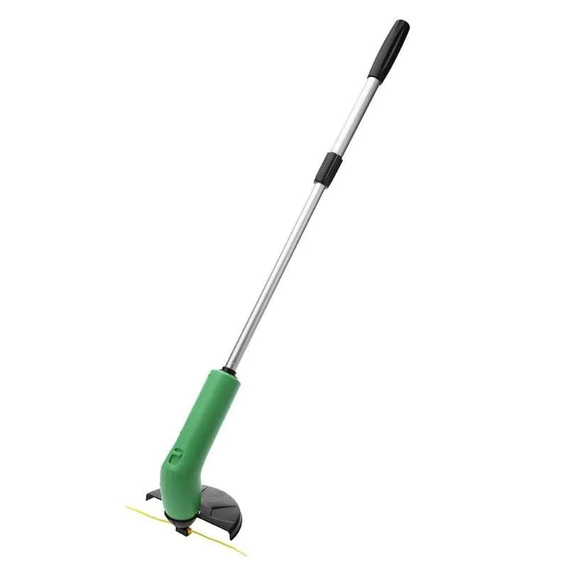 Cordless lawn trimmer with extension pole and protective shield on grass