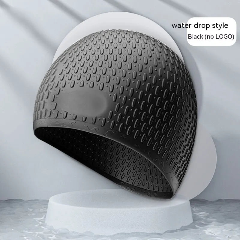 Silicone swimming cap for adults in various solid colours on a white background.