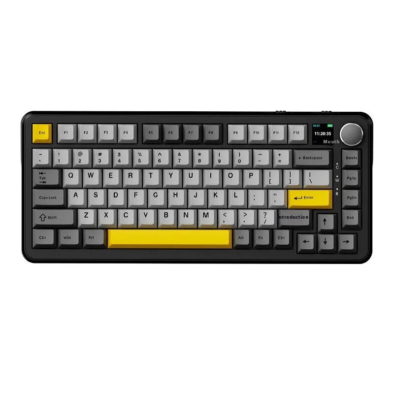 Black, grey and yellow wireless mechanical keyboard with hot-swappable switches on a desk.