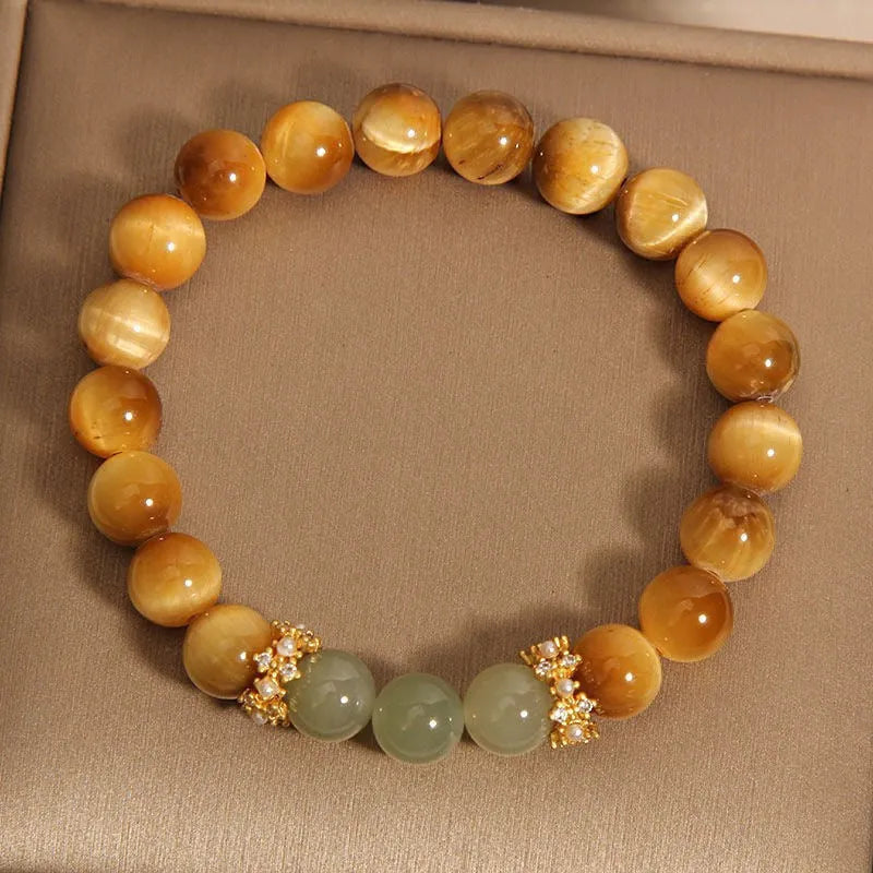 Natural yellow tiger's eye and Hetian jade bracelet with diamond treatment in U-shaped design