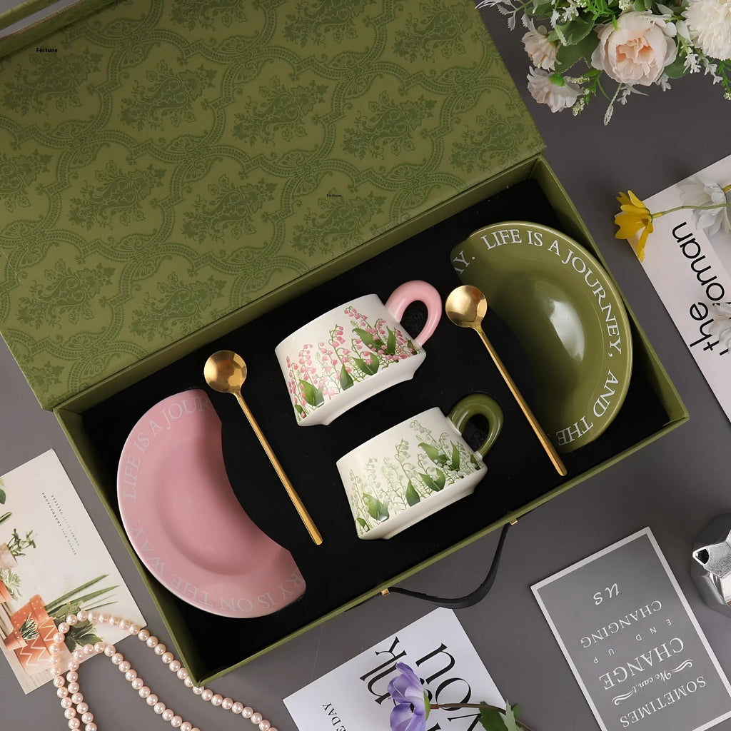 Ceramic coffee cup and saucer set for two people with two colour design options
