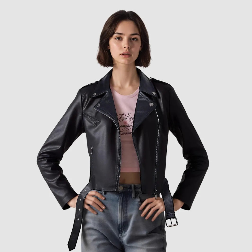 Women's red PU leather short jacket with a lapel collar and waist belt fastened.