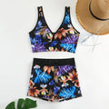 Women's two-piece swimsuit set with printed boxer briefs and sleeveless top on a hanger.