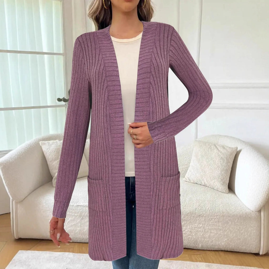 Long sleeve loose fit knitted cardigan jacket with pockets in grey.