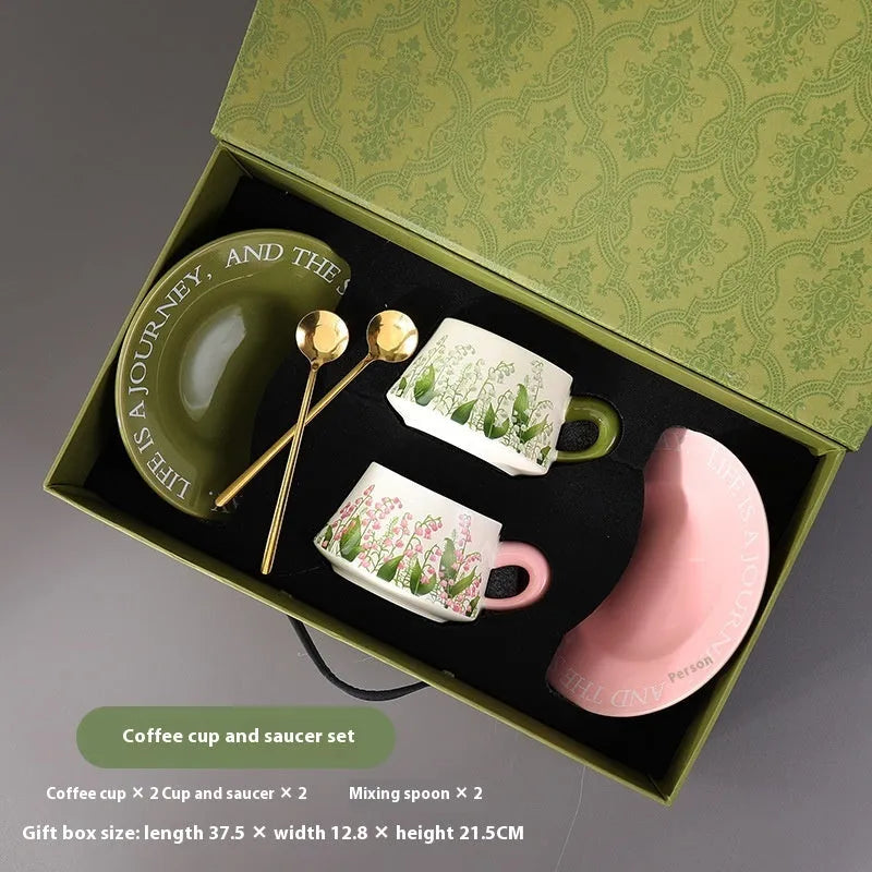 Ceramic coffee cup and saucer set for two people with two colour design options